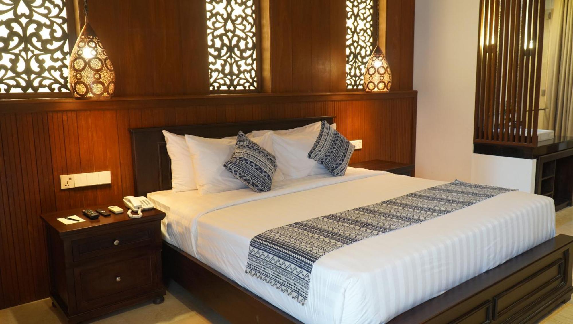 Bali Tropic Resort & Spa - Chse Certified Νούσα Ντούα Εξωτερικό φωτογραφία A bed in a hotel room